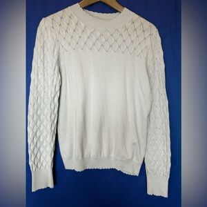 MOTF Soft sweater with quilt like design on arms and shoulders.